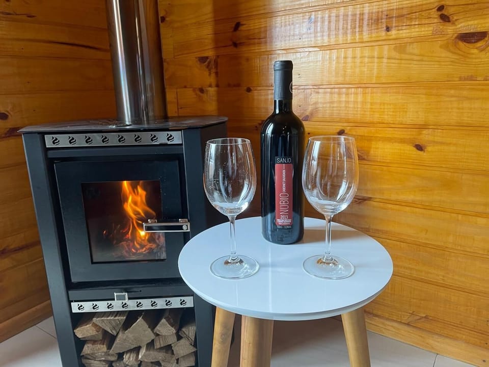 Deluxe Chalet, Mountain View | Living area | Flat-screen TV, fireplace