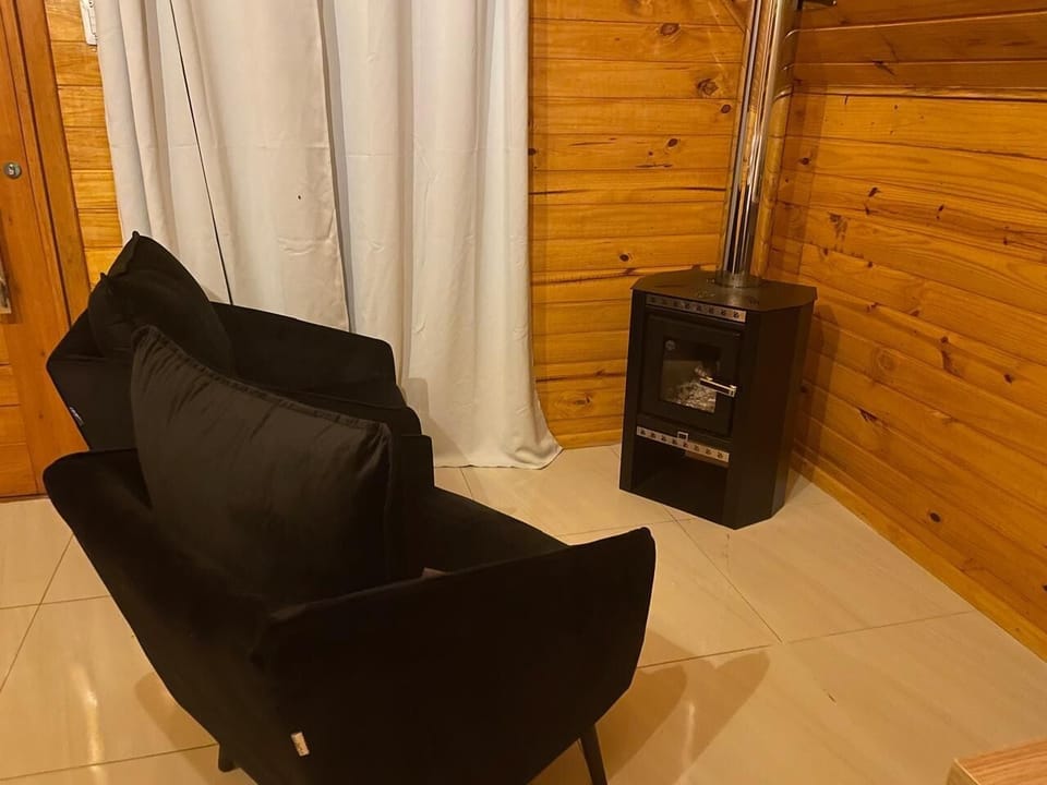 Deluxe Chalet, Mountain View | Living area | Flat-screen TV, fireplace