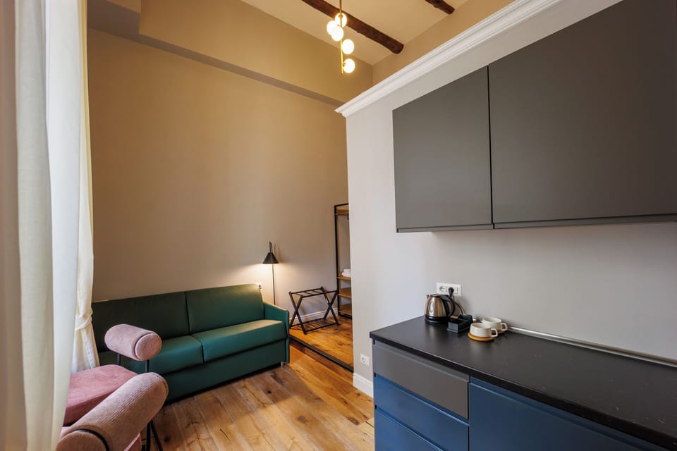 Deluxe Apartment, City View | Living area | Printers