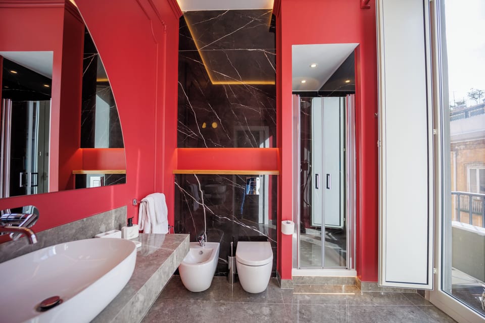 Luxury Suite, City View | Bathroom | Hair dryer, towels, soap, shampoo