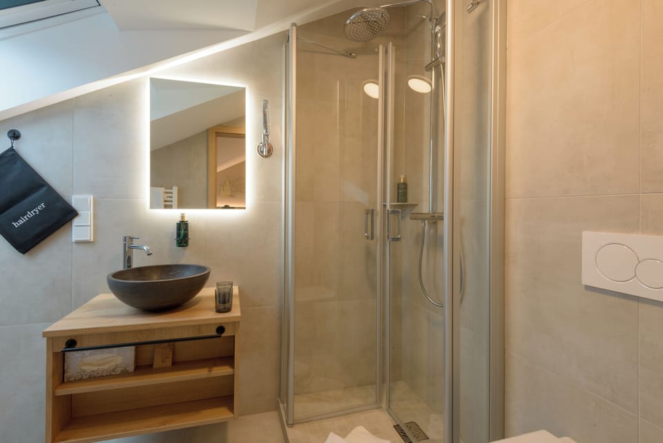 Standard Double Room, 1 Queen Bed | Bathroom | Shower, free toiletries, hair dryer, bathrobes