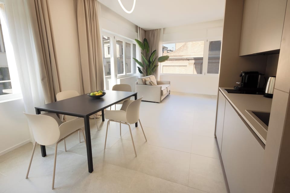 Superior Studio Suite, City View | Free minibar, desk, laptop workspace, free WiFi