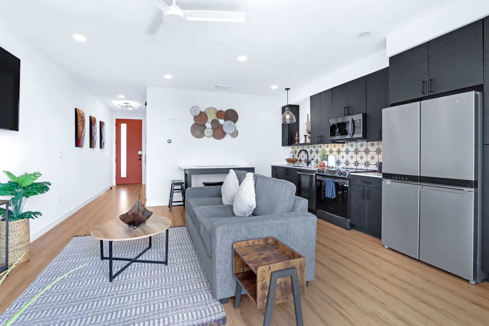 Condo, 1 Double Bed with Sofa bed, Balcony, City View (Hill Country Modern) | Living area | 50-inch flat-screen TV with digital channels