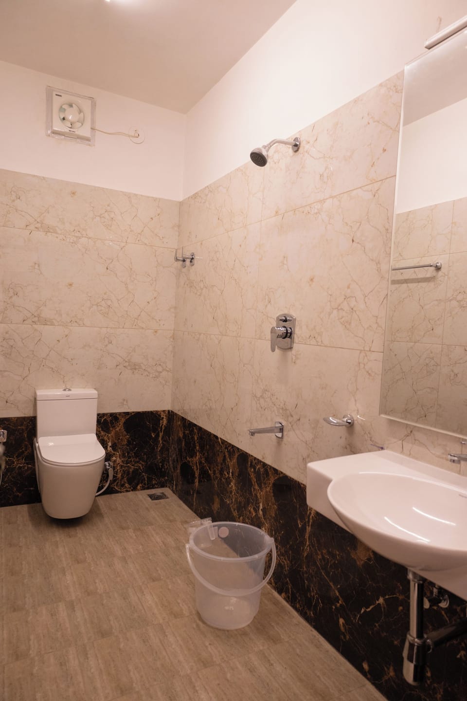 Shower, towels, soap, toilet paper