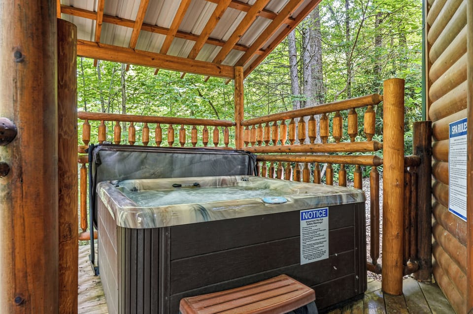 Sit back and relax in the covered hot tub!