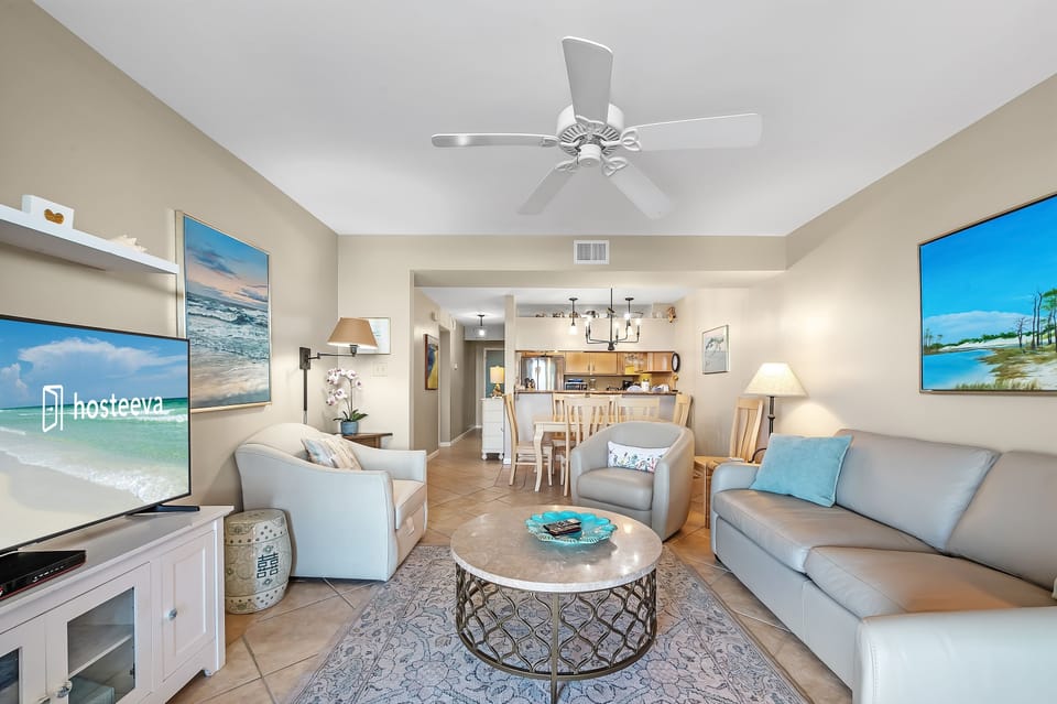 Deluxe Condo, 2 Bedrooms, Non Smoking, Lagoon View | Living room | 50-inch Smart TV with cable channels