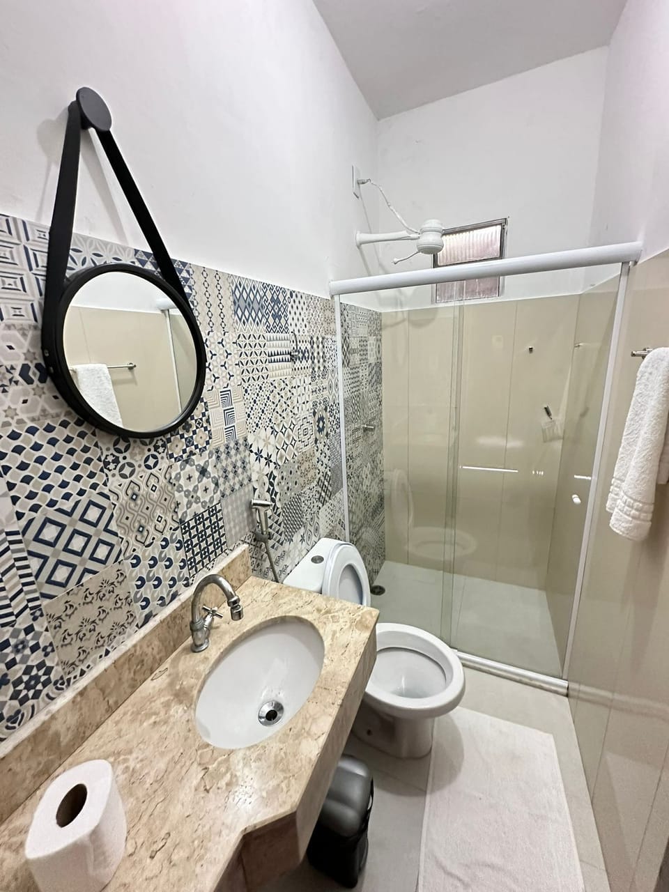 Shower, towels, soap, toilet paper