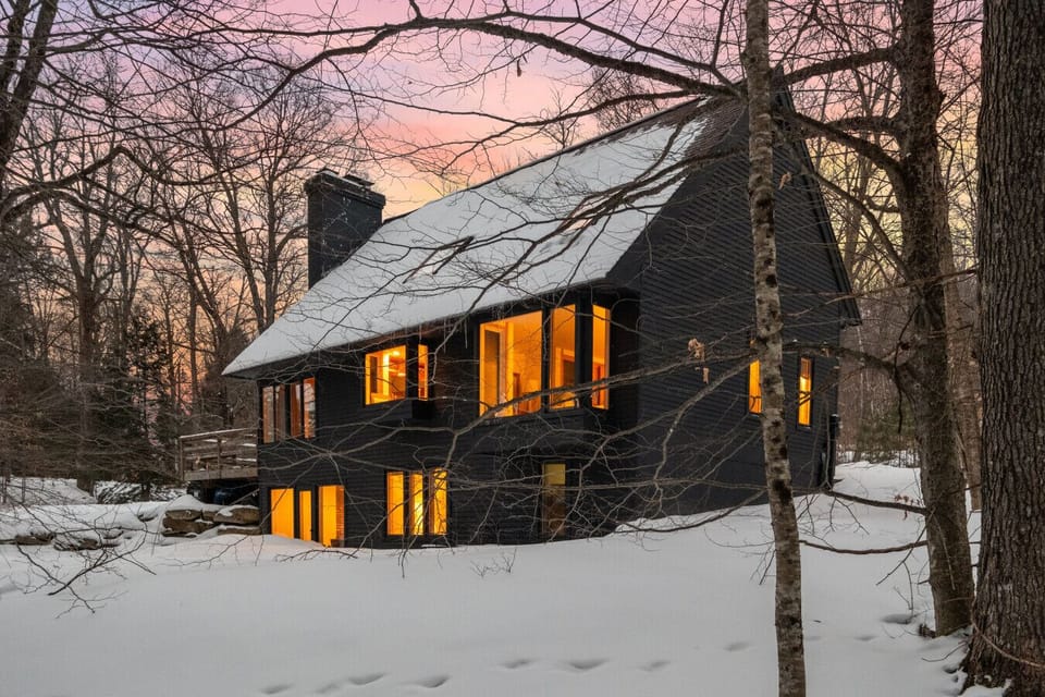 Mountain chalet at sunset. Cozy escape awaits!