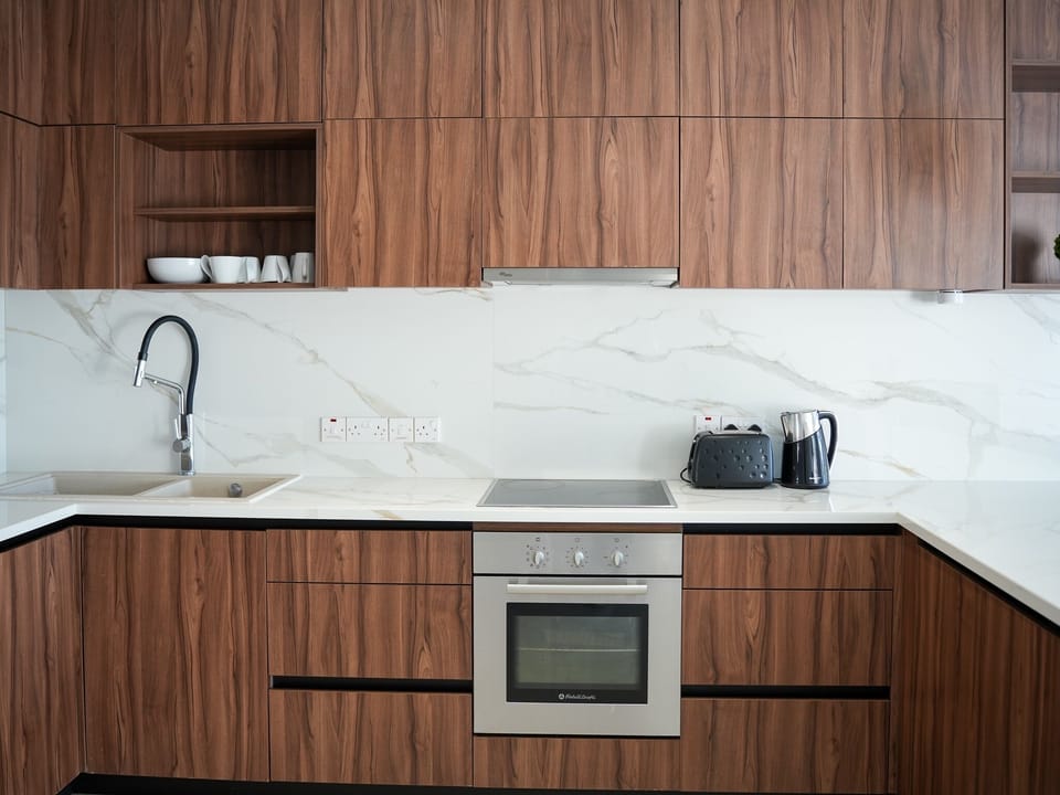Villa | Private kitchen | Fridge, oven, stovetop, dishwasher