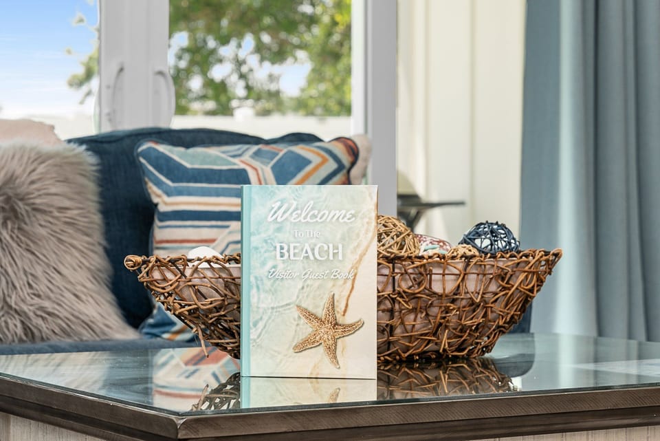 "Welcome to the Beach" book. Leave good thoughts, and wonderful places visited.