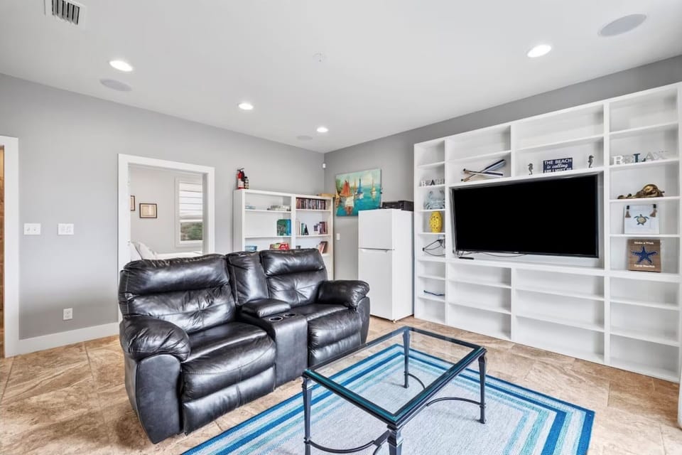 1st Floor Media Room with 65" Smart TV & Refrigerator (plus games/movies/books/puzzles) (1)
