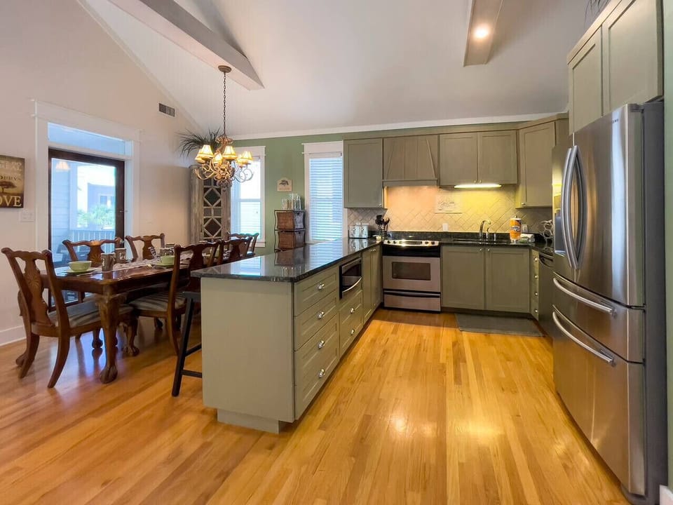 Open concept kitchen, dining and living space
