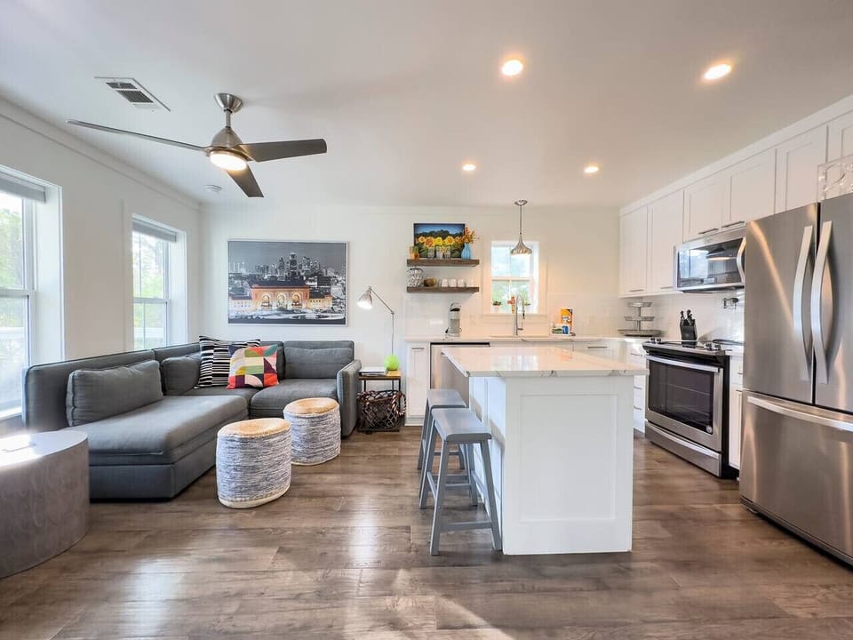 Fully equipped kitchen with stainless steel appliances.