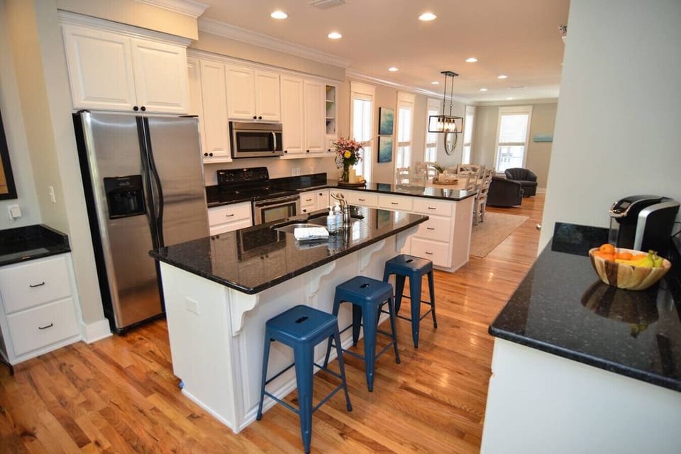 Cook, plan, and store with a kitchen that has it all—desk, prep space, and pantry