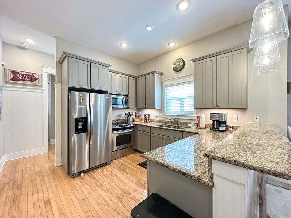 Fully equipped kitchen with stainless steel appliances and everything you need to cook and entertain with ease.