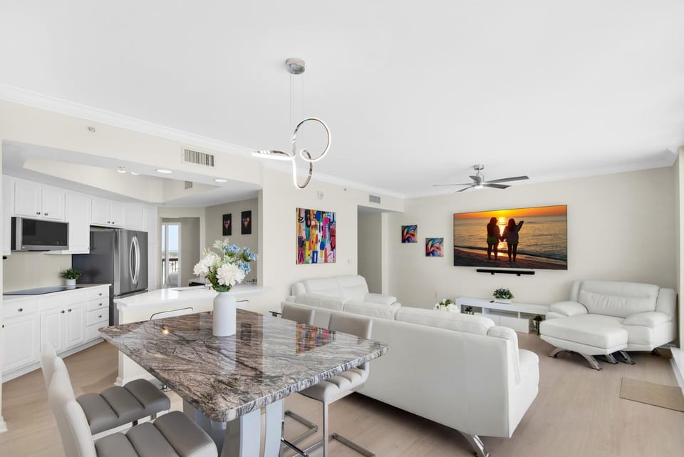 Condo, Multiple Beds (Silver Beach Towers 1003 West) | Living area | TV