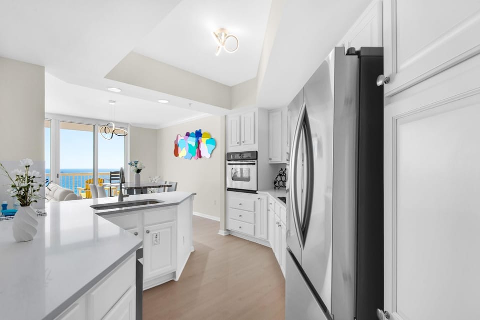 Condo, Multiple Beds (Silver Beach Towers 1003 West) | Private kitchen | Oven, toaster