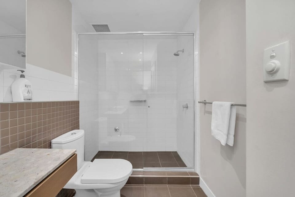 Modern bathroom with a glass-enclosed shower