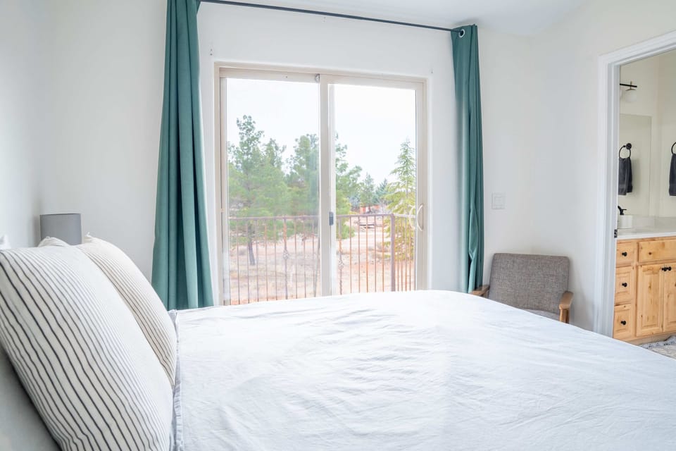 Master Bedroom with ensuite bathroom and private balcony.
