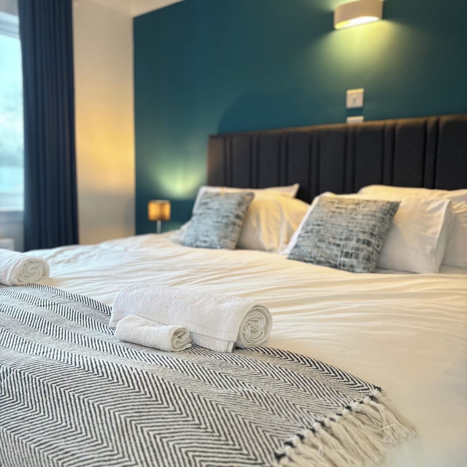 Premium bedding, Select Comfort beds, desk, laptop workspace