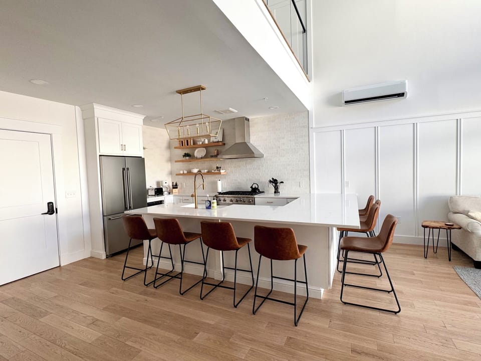 Meal seating for 8 at the counter.