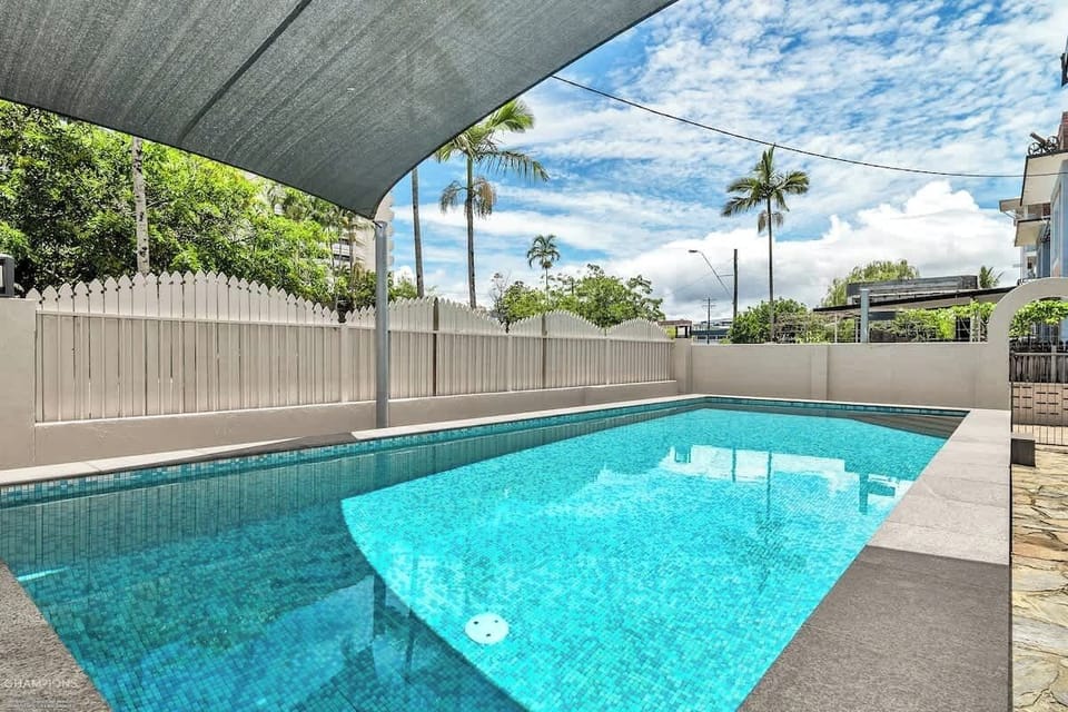 Cool off between Esplanade walks and reef days in the shared pool.