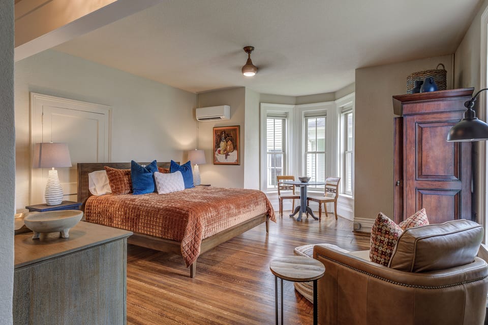 Bedroom with king bed and sitting area