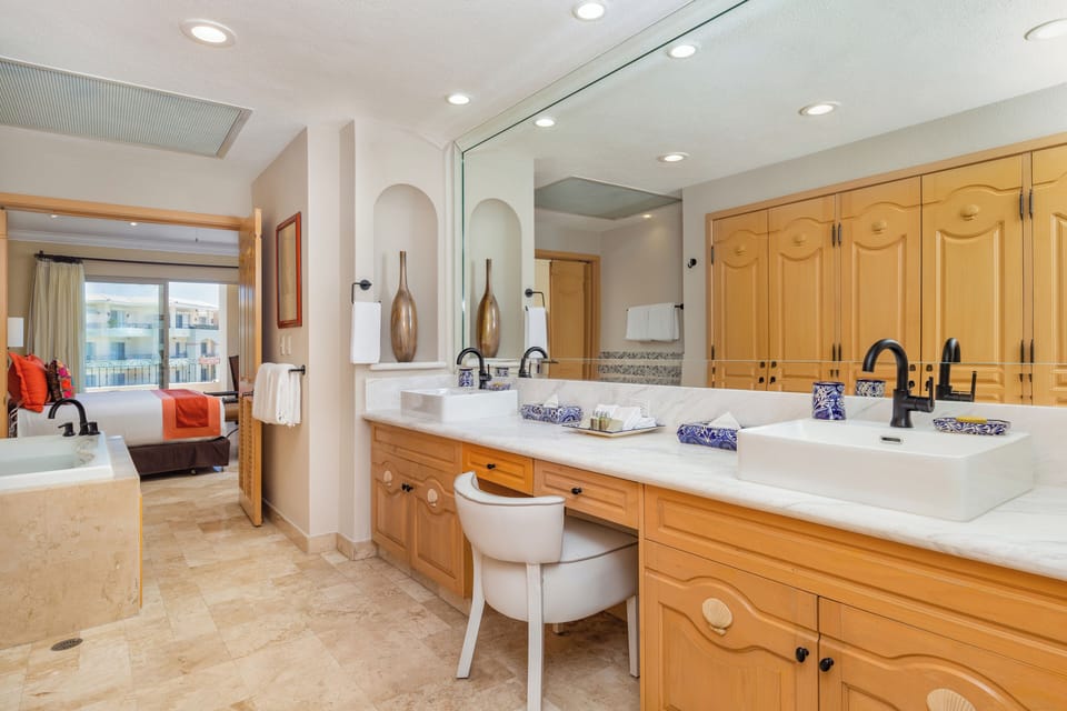 Separate tub and shower, jetted tub, designer toiletries, hair dryer