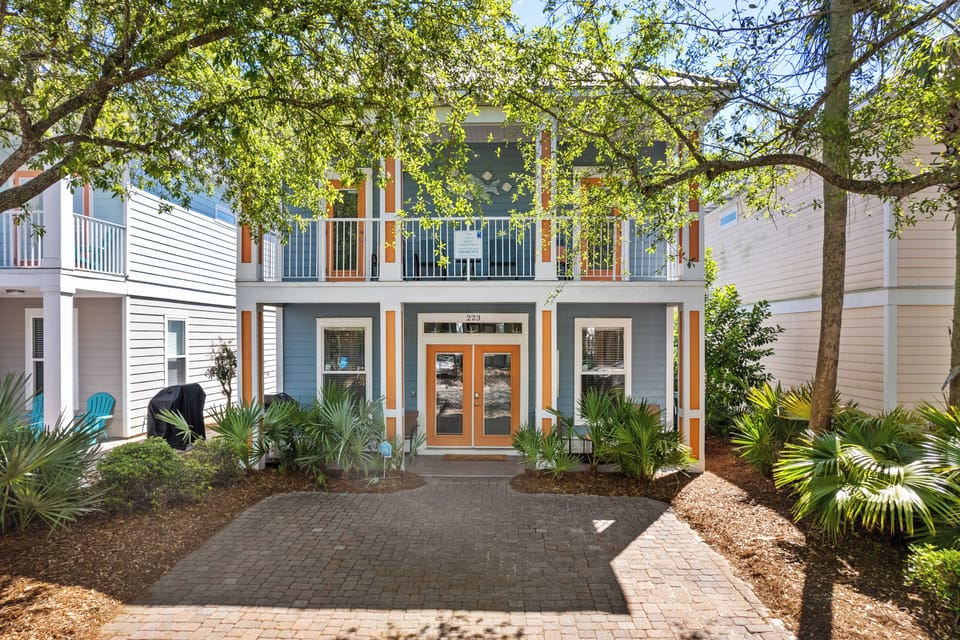 Beautiful lush trees and plants provide ample shade for outside sitting.