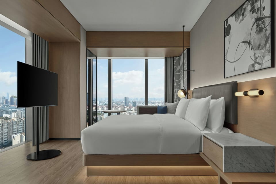 AC Modern Suite | In-room safe, desk, laptop workspace, iron/ironing board