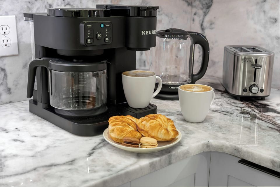 K-cup, Drip Coffee Machine, & Tea Kettle Provided with K-Cups and Ground Coffee.