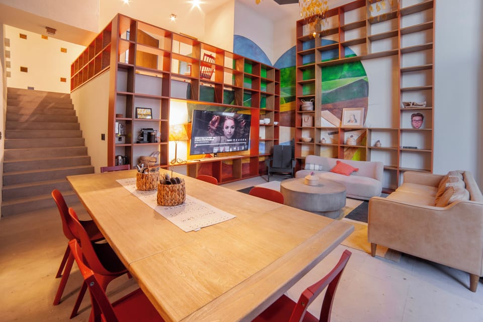 Comfort House, Multiple Beds, Bathtub, City View | Living area | Flat-screen TV