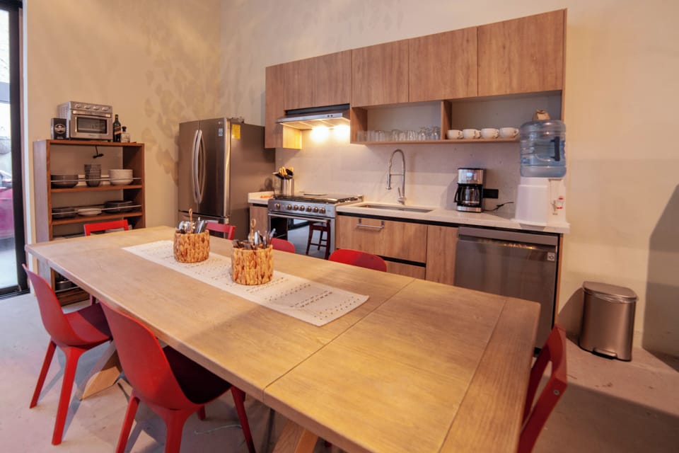 Comfort House, Multiple Beds, Bathtub, City View | Living area | Flat-screen TV