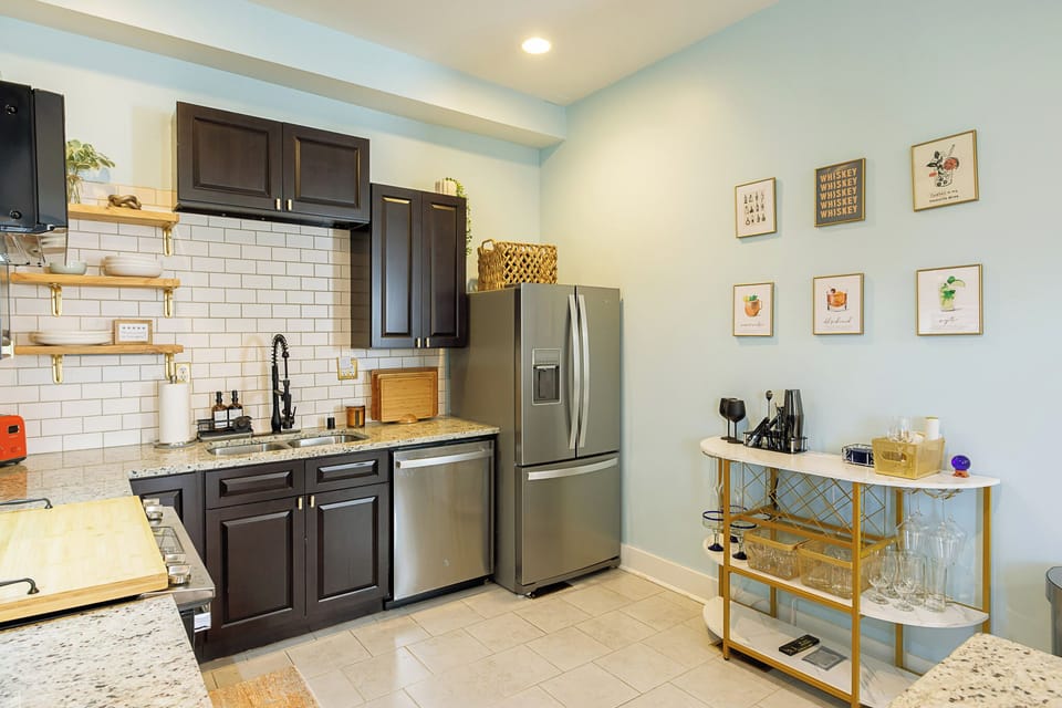 KITCHEN WITH FULL SET OF UTENSILS, POTS, PANS AND COUNTER TOP APPLIANCES