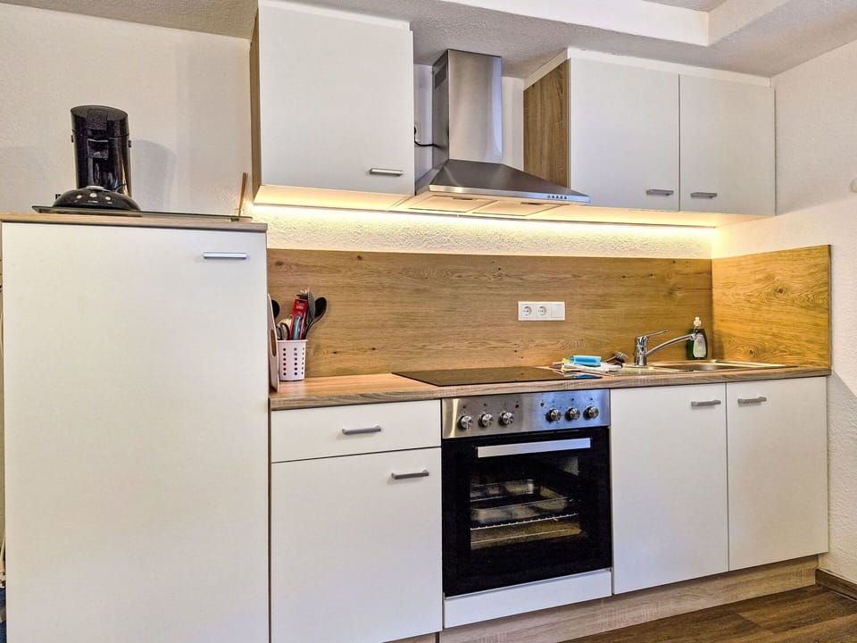 Kitchen Appliance, Countertop, Kitchen, Major Appliance, Cabinetry, Interior Design, Wood, Flooring, Home Appliance, Plumbing Fixture