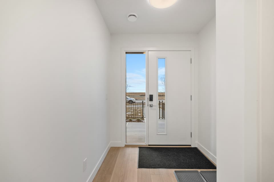 As you enter this unit, you’re greeted by a spacious and inviting entryway.
