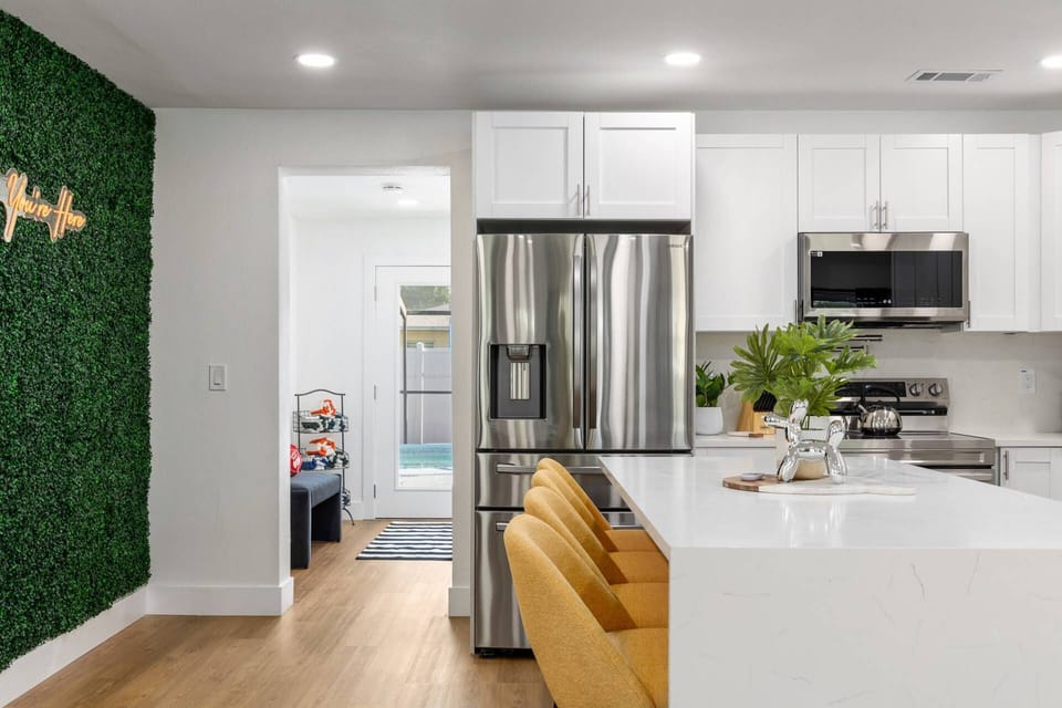 Whether you're prepping brunch or hosting game night, this space is designed for connection