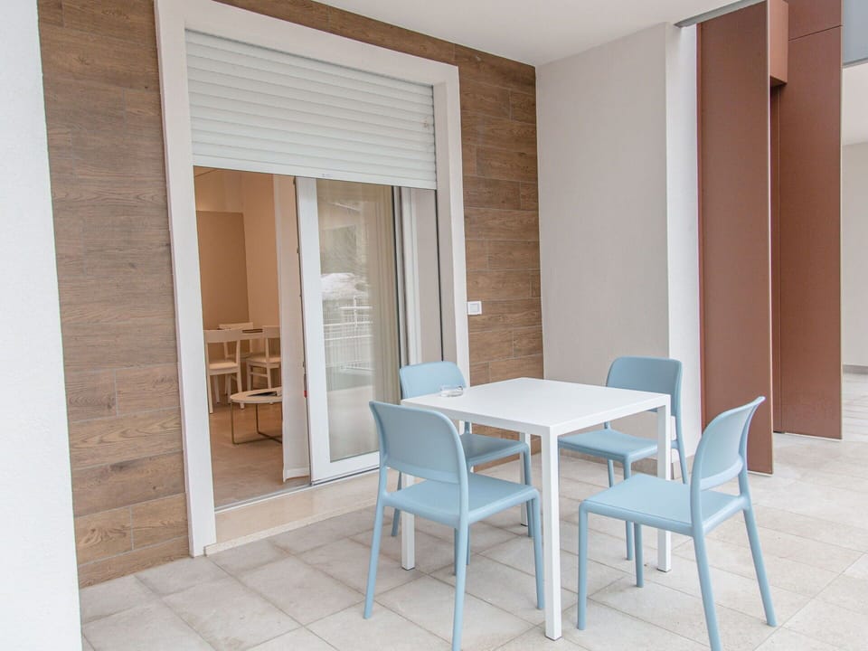 Wood, Flooring, Floor, Interior Design, Furniture, Chair, Home Door, Glass, Shade, Outdoor Furniture