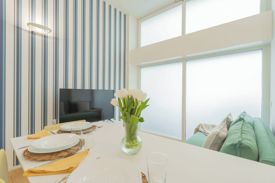 Apartment (1 Bedroom) | Living area | 32-inch Smart TV with cable channels