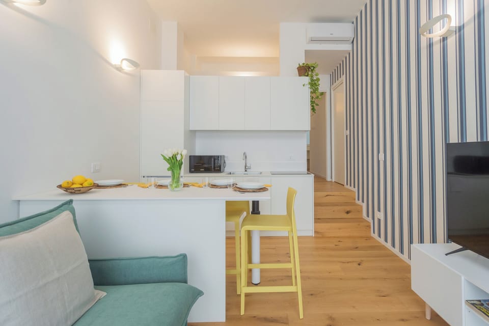Apartment (1 Bedroom) | Living area | 32-inch Smart TV with cable channels
