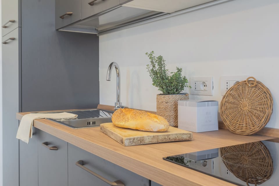 Apartment (1 Bedroom) | Private kitchen | Oven, espresso maker, electric kettle, highchair