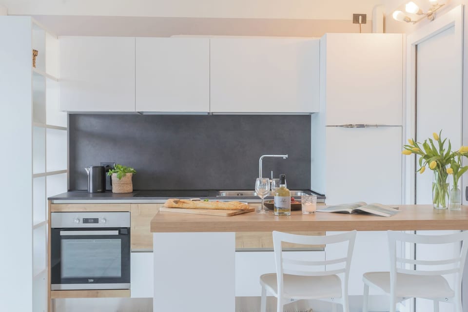Apartment (1 Bedroom) | Private kitchen | Fridge, oven, highchair, cookware/dishes/utensils