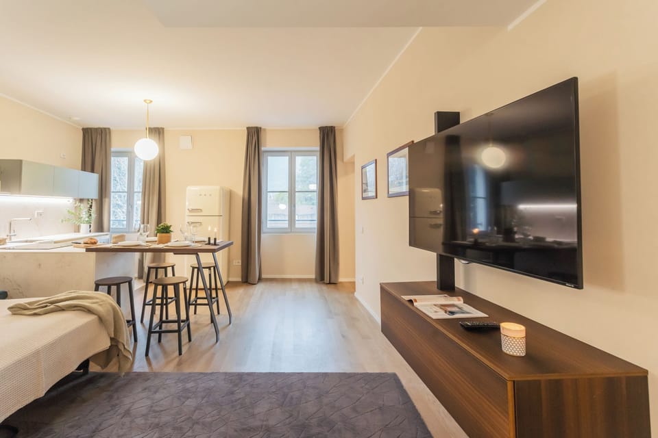 Apartment (1 Bedroom) | Living area | 32-inch TV with cable channels