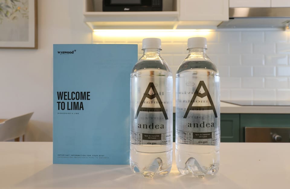 Welcome setup with bottles and booklet.