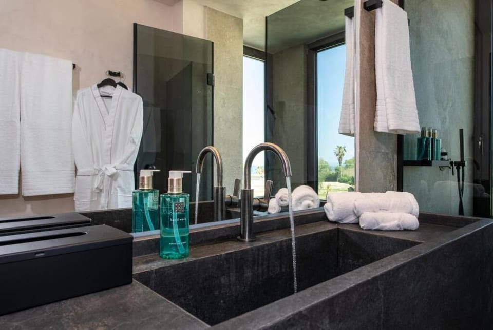 Shower, free toiletries, hair dryer, slippers