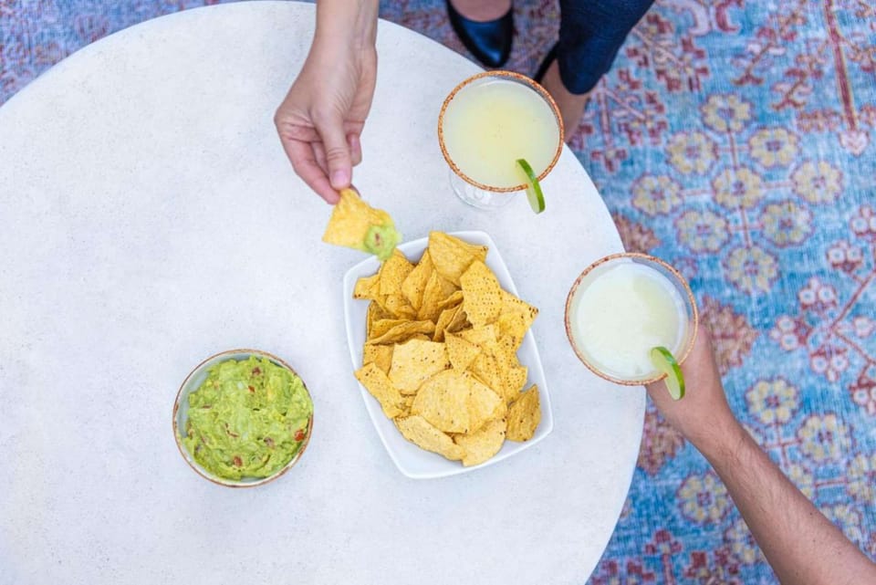 Chips, guacamole, margaritas, sharing.