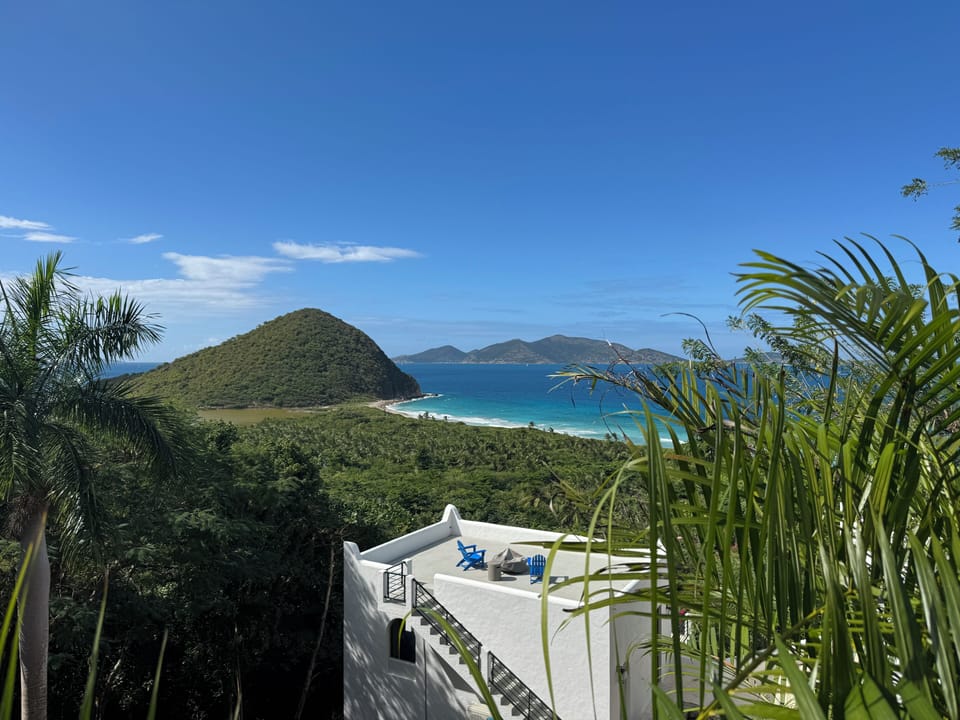 Incredible views over Long Bay beach & Belmont Pond from the rooftop deck