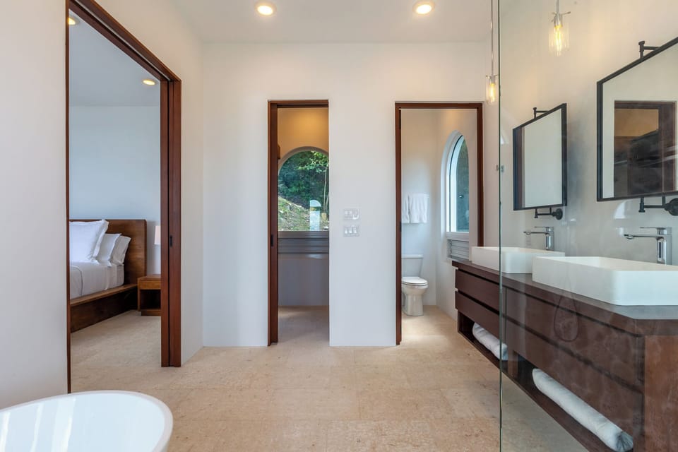 BEDROOM 4 (primary): custom cabinetry in walk-in closet