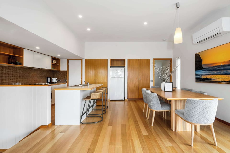 Fully-equipped kitchen and dining space. 