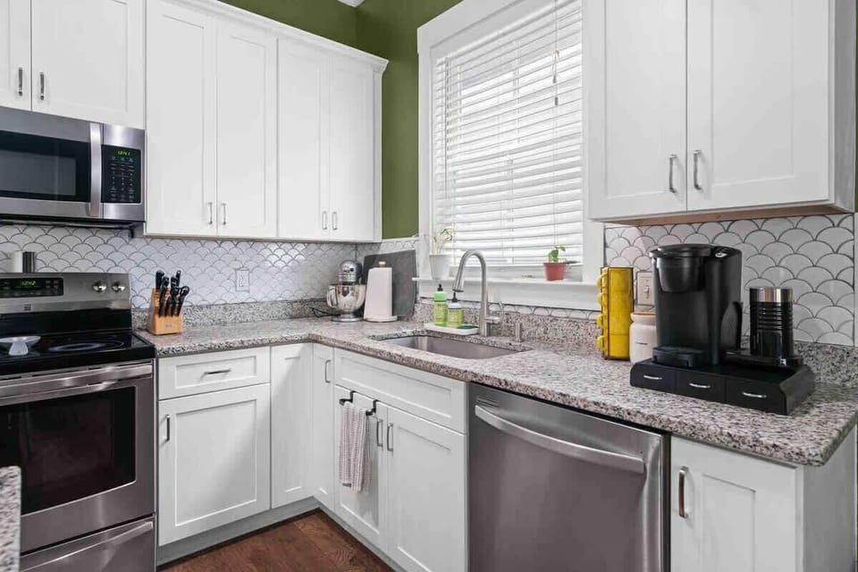 Tiny but Mighty - Our small kitchen features just enough counter space to cook and prepare any meal comfortably.